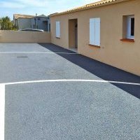 Accès garage en béton poreux et pavés à Brétignolles-sur-Mer