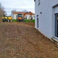 Préparation d'un aménagement de cour et accès garage