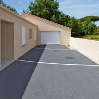 Accès garage en béton poreux et pavés à Brétignolles-sur-Mer