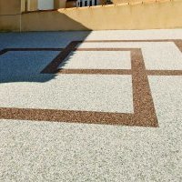 Chemin d’accès et entrée de garage en moquette de pierre aux Sables d’Olonne