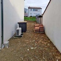 Préparation d'un aménagement de cour et accès garage